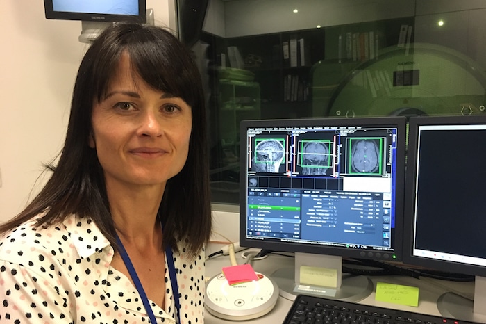 Dr Catherine Morgan at the MRI scanner